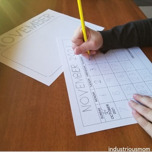 Handwriting practice by tracing numbers of the printable calendar for kids. 